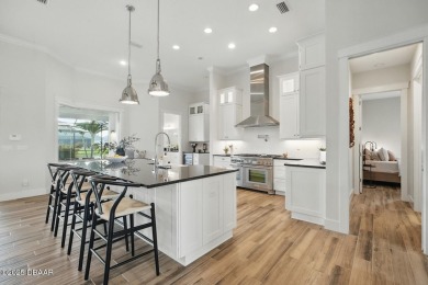 Prepare to be captivated by this luxurious lakefront masterpiece on Venetian Bay Golf Course in Florida - for sale on GolfHomes.com, golf home, golf lot