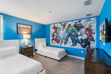 Experience the ultimate Florida lifestyle at 9046 Stinger Dr, a on The Oasis Club at Champions Gate in Florida - for sale on GolfHomes.com, golf home, golf lot