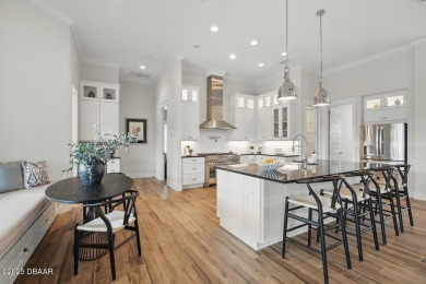 Prepare to be captivated by this luxurious lakefront masterpiece on Venetian Bay Golf Course in Florida - for sale on GolfHomes.com, golf home, golf lot