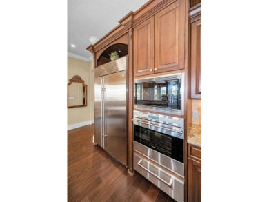 Welcome to an exceptional offering in the gated enclave of on Fox Hollow Golf Club in Florida - for sale on GolfHomes.com, golf home, golf lot