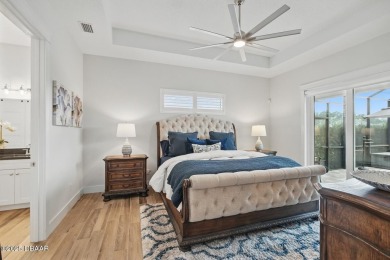 Prepare to be captivated by this luxurious lakefront masterpiece on Venetian Bay Golf Course in Florida - for sale on GolfHomes.com, golf home, golf lot