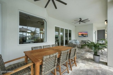 Prepare to be captivated by this luxurious lakefront masterpiece on Venetian Bay Golf Course in Florida - for sale on GolfHomes.com, golf home, golf lot