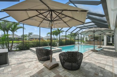 Prepare to be captivated by this luxurious lakefront masterpiece on Venetian Bay Golf Course in Florida - for sale on GolfHomes.com, golf home, golf lot
