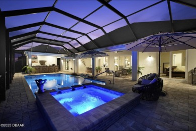 Prepare to be captivated by this luxurious lakefront masterpiece on Venetian Bay Golf Course in Florida - for sale on GolfHomes.com, golf home, golf lot