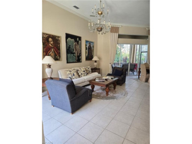 Enter through a private entrance to a peacefully courtyard with on Kensington Golf and Country Club in Florida - for sale on GolfHomes.com, golf home, golf lot