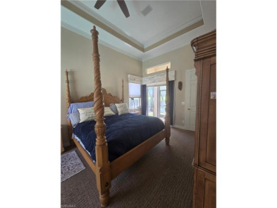 Enter through a private entrance to a peacefully courtyard with on Kensington Golf and Country Club in Florida - for sale on GolfHomes.com, golf home, golf lot