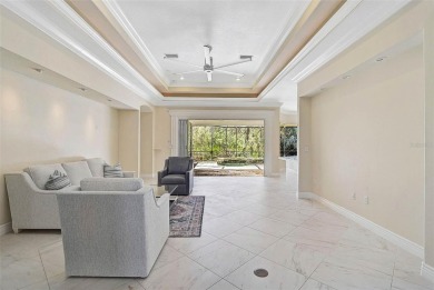 **IMPRESSIVE, MOVE-IN READY, POOL HOME in the Secure and Coveted on The Oaks Club in Florida - for sale on GolfHomes.com, golf home, golf lot