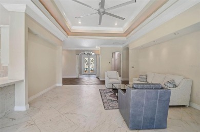 **IMPRESSIVE, MOVE-IN READY, POOL HOME in the Secure and Coveted on The Oaks Club in Florida - for sale on GolfHomes.com, golf home, golf lot