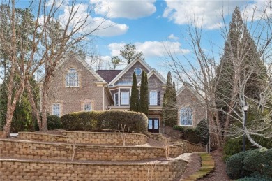 Perched atop a scenic hill, this charming home offers on St. Marlo Country Club in Georgia - for sale on GolfHomes.com, golf home, golf lot