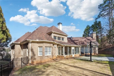 Perched atop a scenic hill, this charming home offers on St. Marlo Country Club in Georgia - for sale on GolfHomes.com, golf home, golf lot