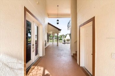 Welcome to a one-of-a-kind Mediterranean masterpiece tucked on Wedgefield Golf Club in Florida - for sale on GolfHomes.com, golf home, golf lot