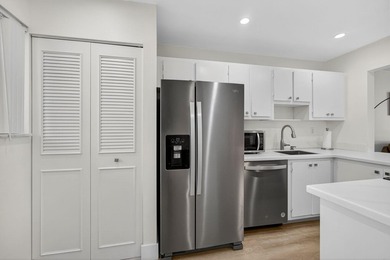 Enjoy the lifestyle you deserve in this renovated 2024 apartment on Miles Grant Country Club in Florida - for sale on GolfHomes.com, golf home, golf lot