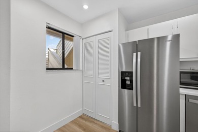 Enjoy the lifestyle you deserve in this renovated 2024 apartment on Miles Grant Country Club in Florida - for sale on GolfHomes.com, golf home, golf lot