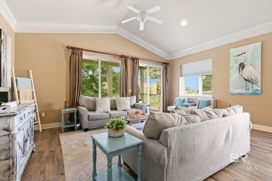 Check out this stunning private corner unit with a screened on Peninsula Golf and Racquet Club in Alabama - for sale on GolfHomes.com, golf home, golf lot