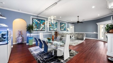 Welcome to a one-of-a-kind Mediterranean masterpiece tucked on Wedgefield Golf Club in Florida - for sale on GolfHomes.com, golf home, golf lot