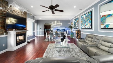 Welcome to a one-of-a-kind Mediterranean masterpiece tucked on Wedgefield Golf Club in Florida - for sale on GolfHomes.com, golf home, golf lot