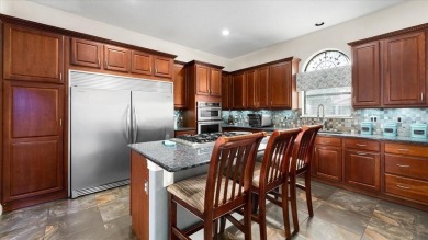 Welcome to a one-of-a-kind Mediterranean masterpiece tucked on Wedgefield Golf Club in Florida - for sale on GolfHomes.com, golf home, golf lot