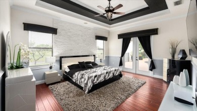 Welcome to a one-of-a-kind Mediterranean masterpiece tucked on Wedgefield Golf Club in Florida - for sale on GolfHomes.com, golf home, golf lot