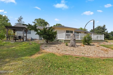 Discover the charm of Briarbrook in this delightful 3-bedroom on Briarbrook Golf Course in Missouri - for sale on GolfHomes.com, golf home, golf lot