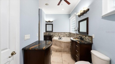 Welcome to a one-of-a-kind Mediterranean masterpiece tucked on Wedgefield Golf Club in Florida - for sale on GolfHomes.com, golf home, golf lot