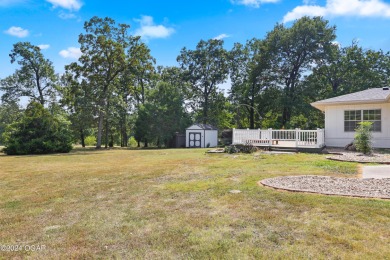 Discover the charm of Briarbrook in this delightful 3-bedroom on Briarbrook Golf Course in Missouri - for sale on GolfHomes.com, golf home, golf lot