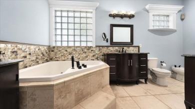 Welcome to a one-of-a-kind Mediterranean masterpiece tucked on Wedgefield Golf Club in Florida - for sale on GolfHomes.com, golf home, golf lot