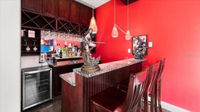Welcome to a one-of-a-kind Mediterranean masterpiece tucked on Wedgefield Golf Club in Florida - for sale on GolfHomes.com, golf home, golf lot
