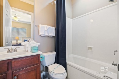 Check out this stunning private corner unit with a screened on Peninsula Golf and Racquet Club in Alabama - for sale on GolfHomes.com, golf home, golf lot