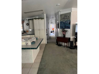 Beautiful and Updated 2+/2 home in The Hamptons Golf and Country on Hamptons Golf Club in Florida - for sale on GolfHomes.com, golf home, golf lot