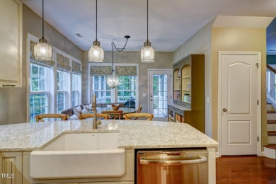 Beautiful home in Wakefield backing up to the executive golf on TPC at Wakefield Plantation in North Carolina - for sale on GolfHomes.com, golf home, golf lot