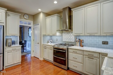 Beautiful home in Wakefield backing up to the executive golf on TPC at Wakefield Plantation in North Carolina - for sale on GolfHomes.com, golf home, golf lot