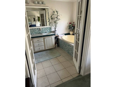 Beautiful and Updated 2+/2 home in The Hamptons Golf and Country on Hamptons Golf Club in Florida - for sale on GolfHomes.com, golf home, golf lot
