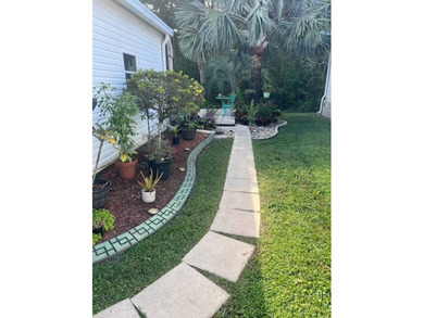 Beautiful and Updated 2+/2 home in The Hamptons Golf and Country on Hamptons Golf Club in Florida - for sale on GolfHomes.com, golf home, golf lot