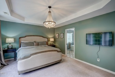 Beautiful home in Wakefield backing up to the executive golf on TPC at Wakefield Plantation in North Carolina - for sale on GolfHomes.com, golf home, golf lot