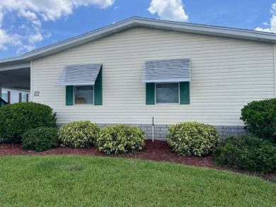 Charming and Updated Home - with 2 Bedroom, 2 Bath, 1,200 Sq Ft on Four Lakes Golf Club in Florida - for sale on GolfHomes.com, golf home, golf lot