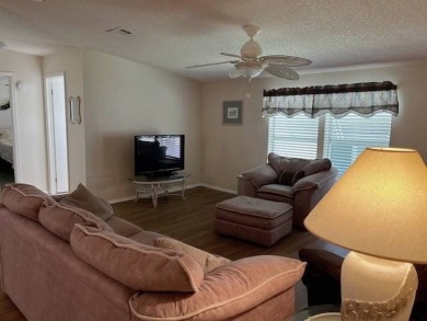 Charming and Updated Home - with 2 Bedroom, 2 Bath, 1,200 Sq Ft on Four Lakes Golf Club in Florida - for sale on GolfHomes.com, golf home, golf lot