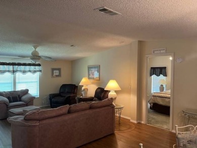 Charming and Updated Home - with 2 Bedroom, 2 Bath, 1,200 Sq Ft on Four Lakes Golf Club in Florida - for sale on GolfHomes.com, golf home, golf lot