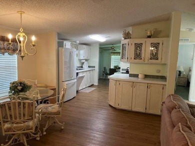 Charming and Updated Home - with 2 Bedroom, 2 Bath, 1,200 Sq Ft on Four Lakes Golf Club in Florida - for sale on GolfHomes.com, golf home, golf lot