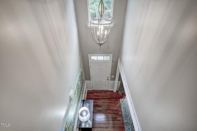 Beautiful home in Wakefield backing up to the executive golf on TPC at Wakefield Plantation in North Carolina - for sale on GolfHomes.com, golf home, golf lot