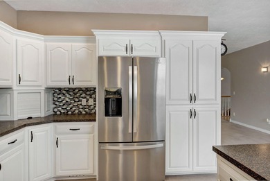 Spring views, space, and value come together in this golf-course on Fremont Hills Country Club in Missouri - for sale on GolfHomes.com, golf home, golf lot