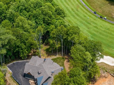 This beautifully designed contemporary home by Garrell on Highlands Falls Country Club in North Carolina - for sale on GolfHomes.com, golf home, golf lot