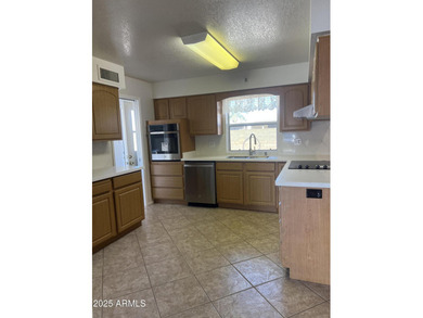 CHARMING MODEL 600 IN SUNLAND VILLAGE-MESA'S PREMIER 55+ on Sunland Village Golf Club in Arizona - for sale on GolfHomes.com, golf home, golf lot