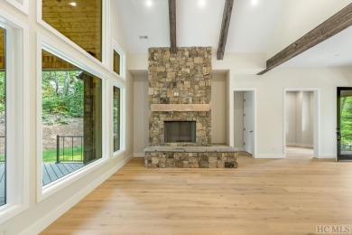 This beautifully designed contemporary home by Garrell on Highlands Falls Country Club in North Carolina - for sale on GolfHomes.com, golf home, golf lot