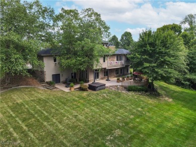 WOW!! Don't miss this Frank Lloyd Wright inspired Ranch on Roses Run Country Club in Ohio - for sale on GolfHomes.com, golf home, golf lot