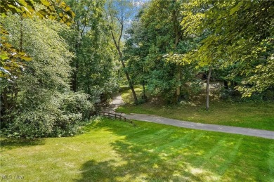 WOW!! Don't miss this Frank Lloyd Wright inspired Ranch on Roses Run Country Club in Ohio - for sale on GolfHomes.com, golf home, golf lot