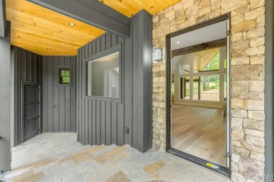 This beautifully designed contemporary home by Garrell on Highlands Falls Country Club in North Carolina - for sale on GolfHomes.com, golf home, golf lot