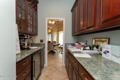 Enjoy elegant golf course living at its best in this impressive on Pinewild Country Club of Pinehurst in North Carolina - for sale on GolfHomes.com, golf home, golf lot