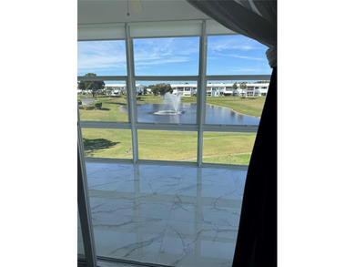 Beautifully Upgraded 2nd floor 2bedroom 2 Bath condo. Corner on Leisureville Community Association in Florida - for sale on GolfHomes.com, golf home, golf lot