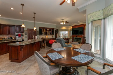 Enjoy elegant golf course living at its best in this impressive on Pinewild Country Club of Pinehurst in North Carolina - for sale on GolfHomes.com, golf home, golf lot