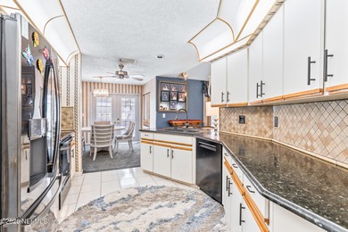 Beautiful 3-bedroom, 2-bath home offering an open layout and on The Grand Club Cypress Course in Florida - for sale on GolfHomes.com, golf home, golf lot